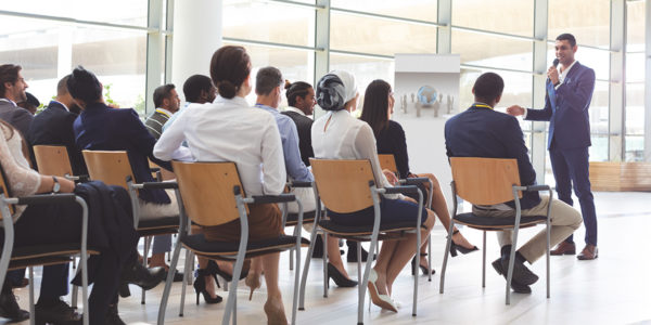 Businessman speaking in a business seminar